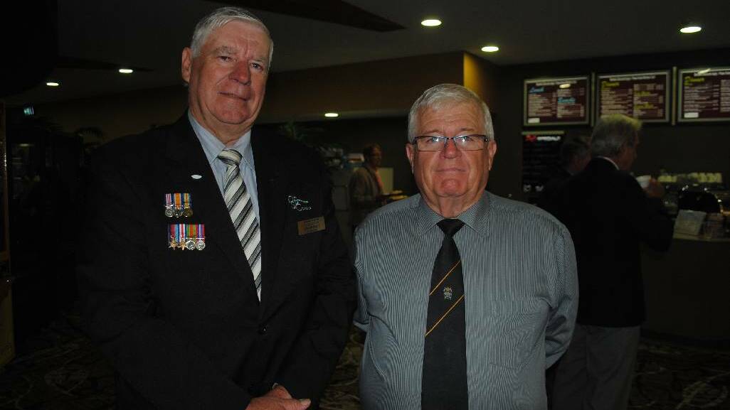 SERVICES: President of Club Narooma Graham Reeve with president of the Narooma RLS sub branch Paul Naylor.