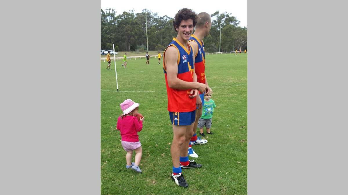 GO THE MIGHTY LIONS: Narooma Lions’ Tommy Clarke (pictured left) and Rowan Hawkey hanging with their young fans at the SCAFL pre-season carnival.