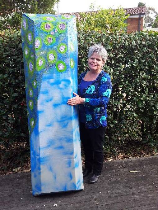 PAINTED COFFIN: There will be coffins on display this Friday, including Shanna Provost's hand-painted cardboard coffin.
