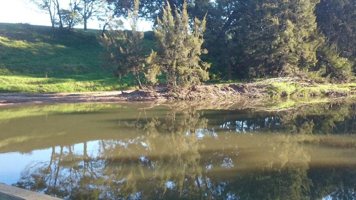 DIRTY WATER: The turbidity in the Tuross River was flowing near Comerang Forest Road, near Bodalla on Friday.