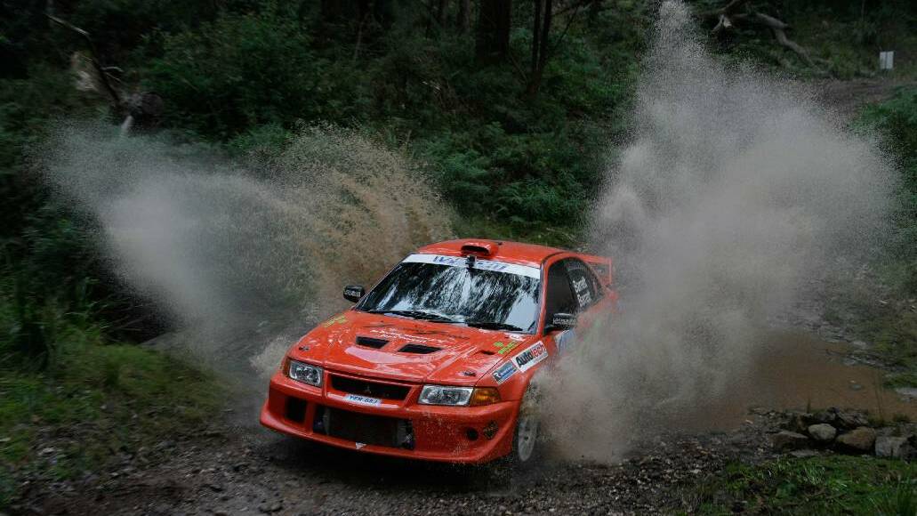 FOREST RALLY: Winners Michael and Thomas Barrett in their Mitsubishi EVO. Photo Peter Norton