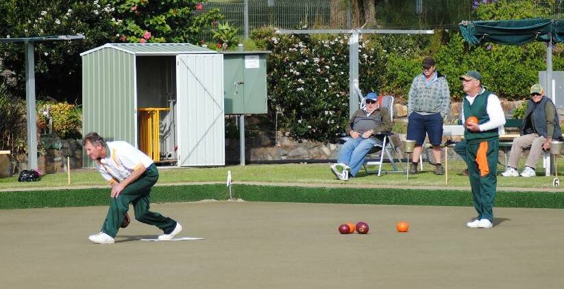 TUROSS BOWLS: Bruce Lidbury adding to his score in the Major Singles, with Joe Kosanic in the background at Tuross Head Bowling Club.