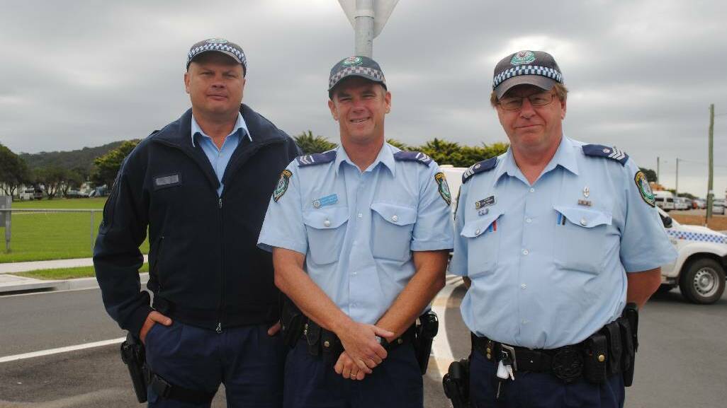 COPS ARE TOPS: Senior constable Andrew Barry with Senior Constable Scott Wharfe and Sargent Steve Mawson.