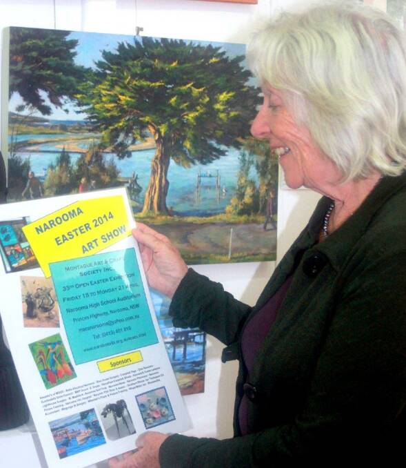 MACS SHOW: Esther Ross, visiting from Launceston, checking the details of MACS Easter Exhibition at Narooma High School, opening at 4.30pm this Friday, and running over the Easter weekend.