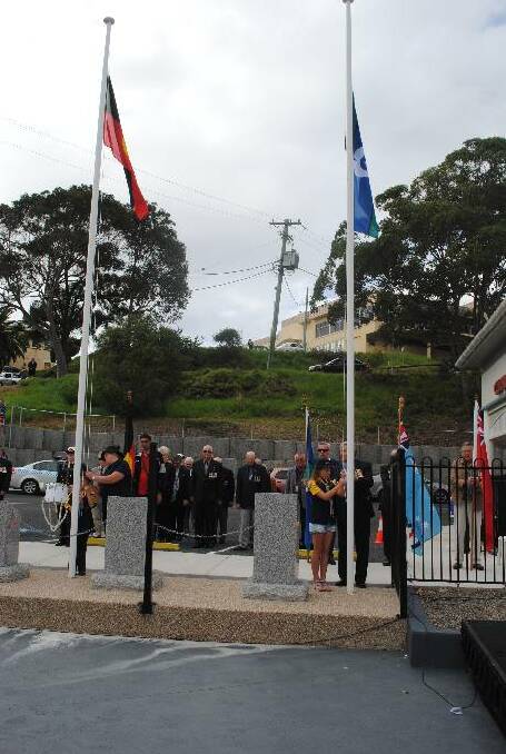 FLAG RAISING: The Narooma Joey Scouts assisted raising the flag.