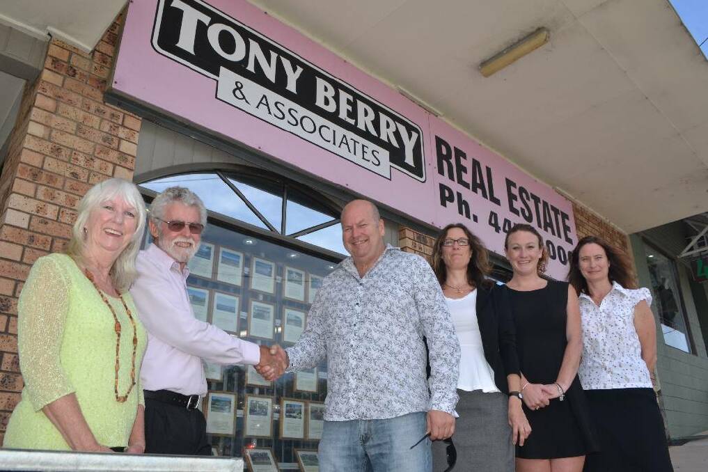 HANDING OVER: Gail and John Green hand over the business to Rob Hamilton and his staff Penny Cope, Jess Dale and Jenny Foster from LJ Hooker Narooma and Dalmeny.