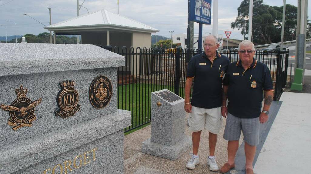 UPGRADED: The Narooma War Memorial at Club Narooma has been upgraded recently with two new flag poles and six new pillars commemorating the South Africa Boar War, WWI, WWII, Korean War, Malaysian Emergency and Vietnam War. Pictured are Narooma RSL treasurer Jon King and president Paul Naylor.