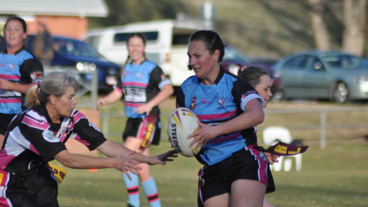 PLAY MAKER: Moruya Sharkettes player Ellie Doherty evades Cooma Fillies defenders on Saturday. 