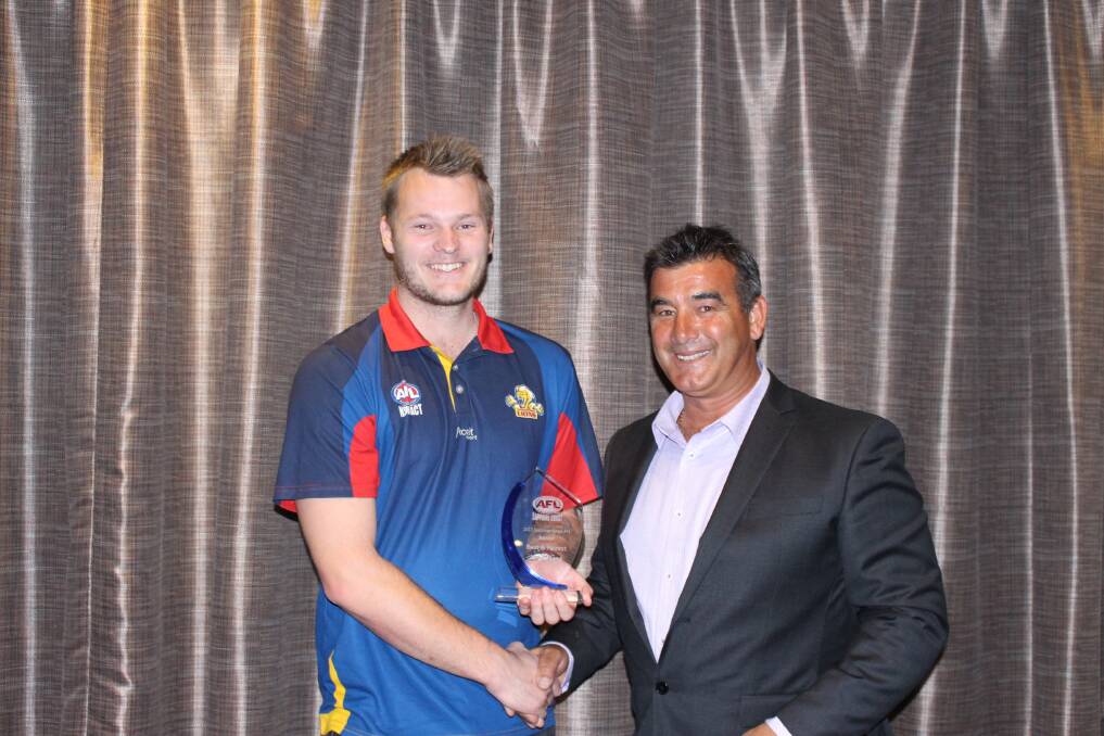 B&F: Jordan Lang receiving the Sapphire Coast AFL's Best and Fairest award.