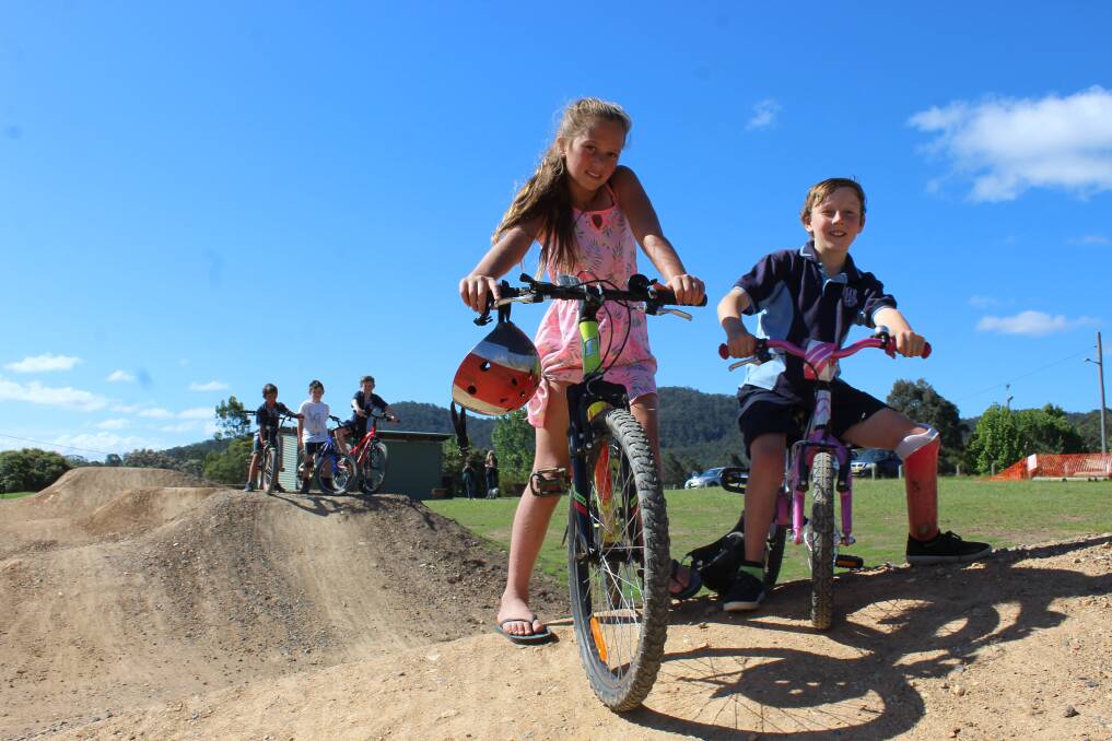 READY TO GO: Cobargo bike riders Hazel Robinson and Jack Grebert lead the pack of Fletcher Robinson, Henry Blackford and Nate Miller around the new BMX track.