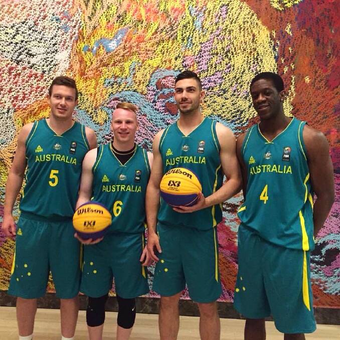 Darcy Harding (second from right) teamed up with Andrew Steel, Lucas Barker, and Owen Odigie to bring home a bronze medal. Photo: FIBA