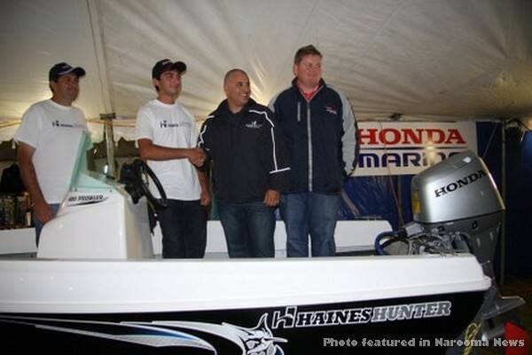 BOAT WINNER: This boat package worth over $20,000 was put together from the following: Canberra Game Fishing Club, Haines Hunter, Honda Marine, GME, and Tackle World, Canberra. Pictured are Mr. Xiberras, lucky angler’s father, Matt Xiberras, the winner, then John Haber, president of Haines Hunter, and John Kirby Clarke representing Honda Marine. The Xiberrases are from Jervis Bay Game Fishing Club