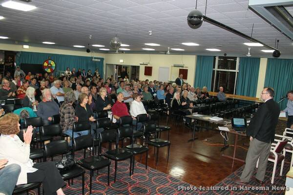 WOOLIES MEETING: Retail planner Angus Witherby presents survey findings about the impact of the proposed Bermagui Woolworths to around 200 people at Bermagui Country Club on Thursday evening.