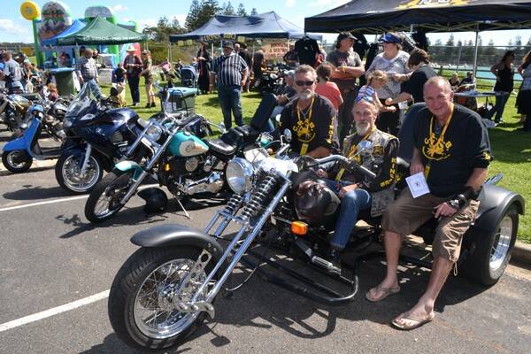 ORGANISERS: Sitting back on the trike and taking it all in are Bermagui CRABs founder Rob Grimstone, club member Mick Flynn and club president Peter Cox.