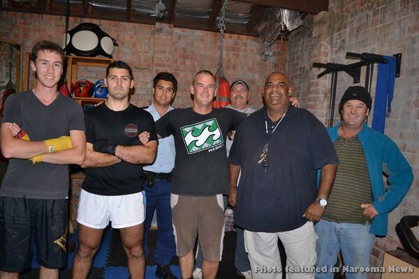 PCYC CREW: Getting excited about the new PCYC boxing facilities in the district are (foreground) trainee boxers Tommy Hofsteede and Simon Davies, coach and Senior Constable Scott Wharf, Aboriginal community liaison officer Eddie Moore, trainer Steve Spears; and (back) Senior Constable Gavin Warner and Tommy’s dad and trainer Adrian.