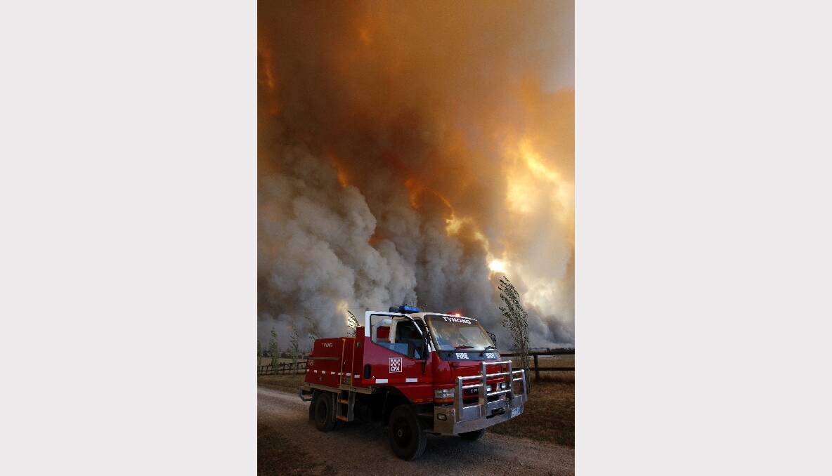 CFA members prepare as a fire approaches Labertouche. Photo: REUTERS