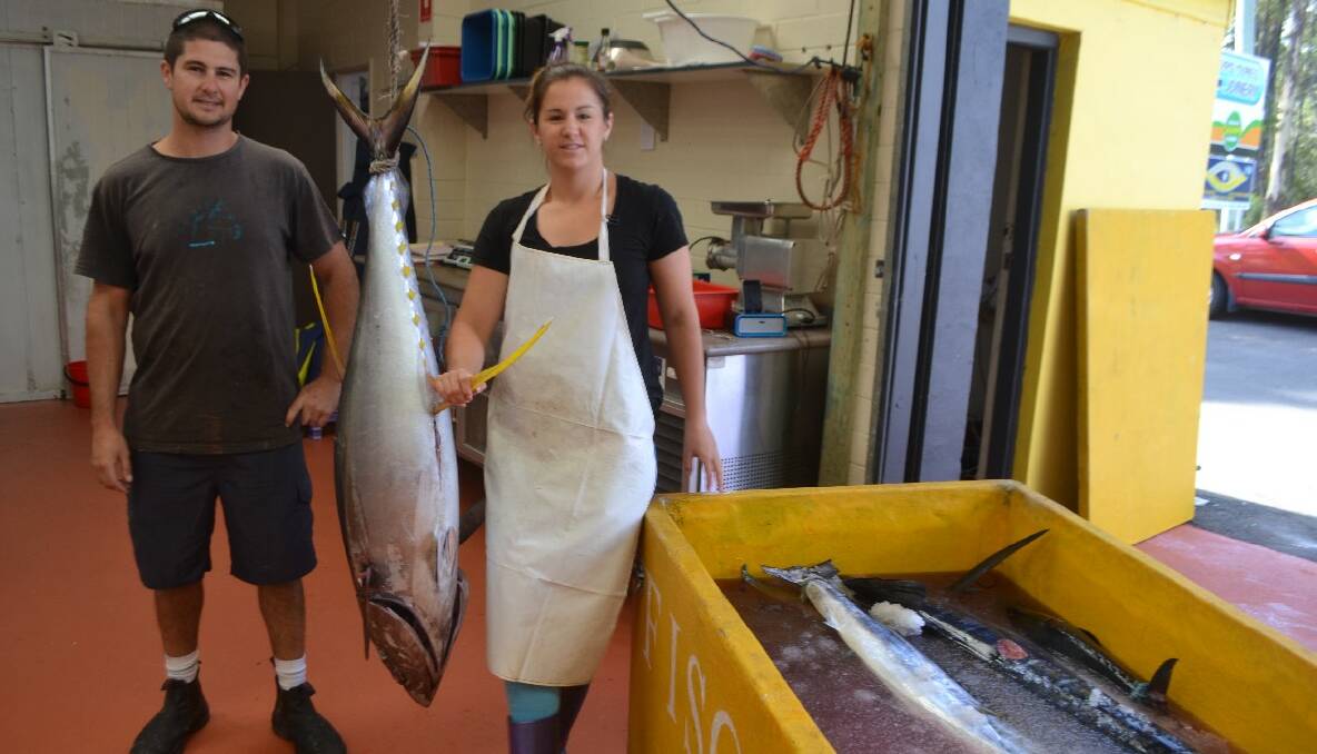 NEW FACTORY: The Abbott’s factory on Glasshouse Rocks Road has been transformed into a state-of-the-art fish processing plant and here is Hayley and brother Todd and a decent yellowfin. 