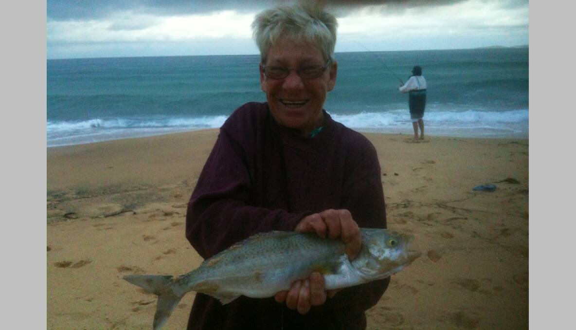 CLUB SALMON: Jill Johnston of Narooma Sport and Gamefishing Club with a nice salmon caught off Carter's Beach on a pilchard tail while fishing in the club's December competition on Saturday morning. 