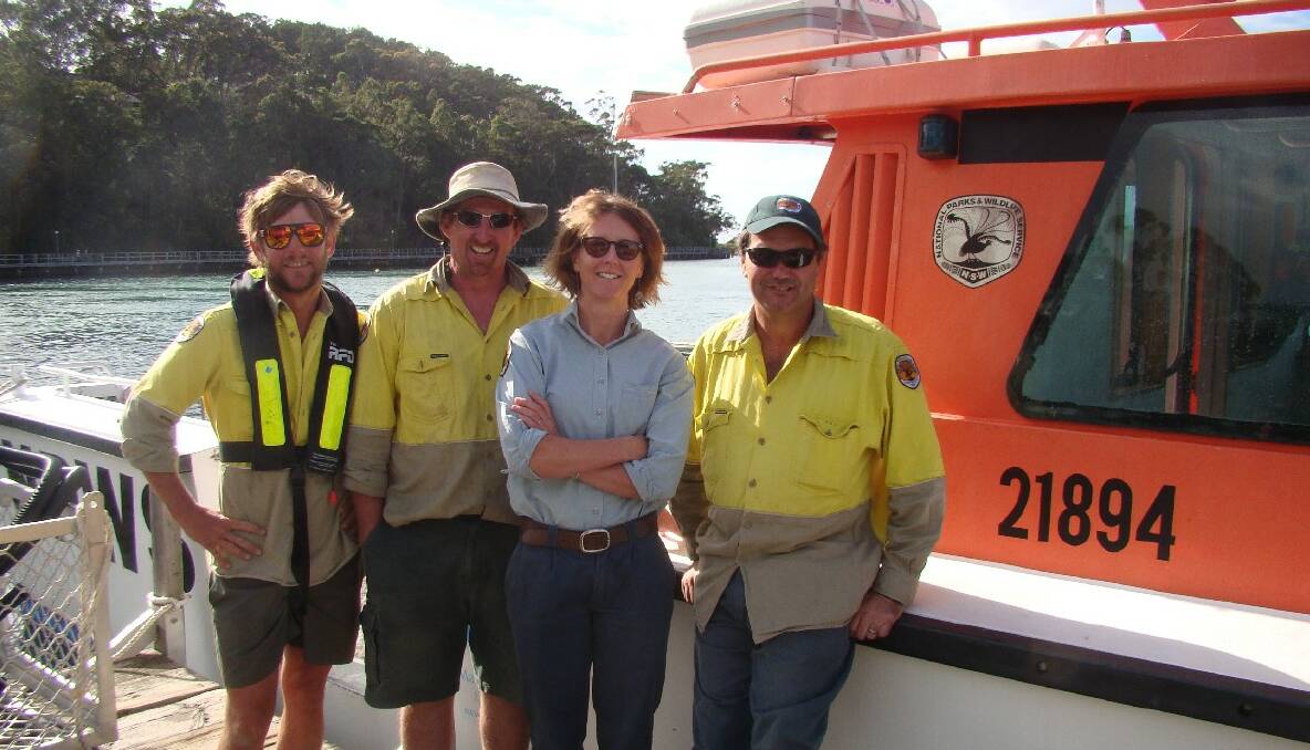 ISLAND CREW: National Parks field officers François van Zyl and Steven Hutcheson, discovery coordinator Cassandra Bendixsen and senior field officer Andy Young about to leave Narooma for a visit to Montague Island. 
