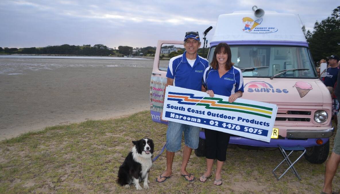 OUTDOOR SIGN: Taking the opportunity for a bit of promotion with their own sign were Geoff and Sue-Anne Newton and Tully from South Coast Outdoor Products. 