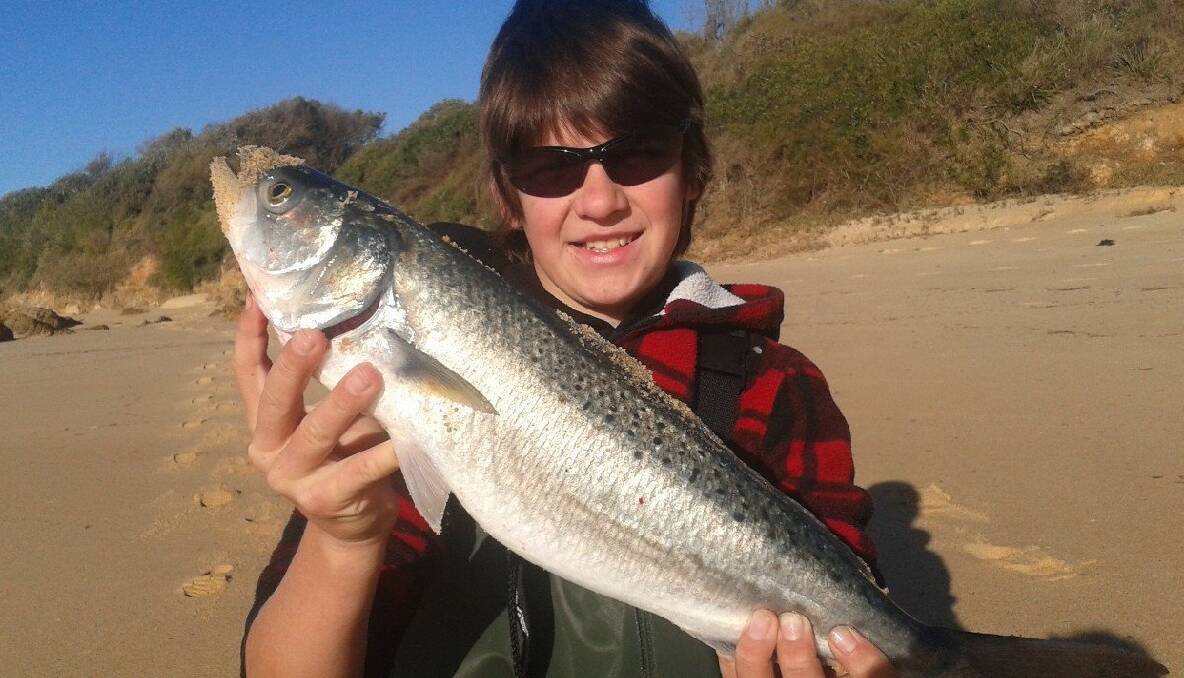NICE SALMON: Riley went fishing with his dad Dash for this nice salmon....