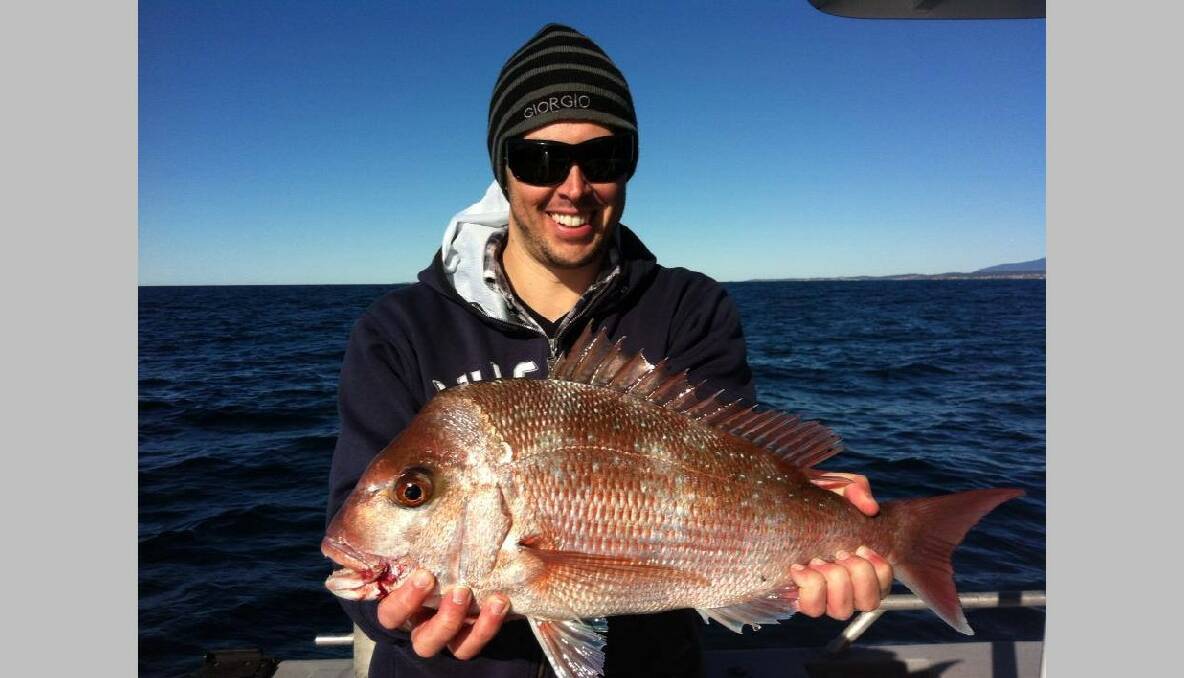 CHARTER FISH: Client Simo Ried and a snapper caught on Charter Fish Narooma...