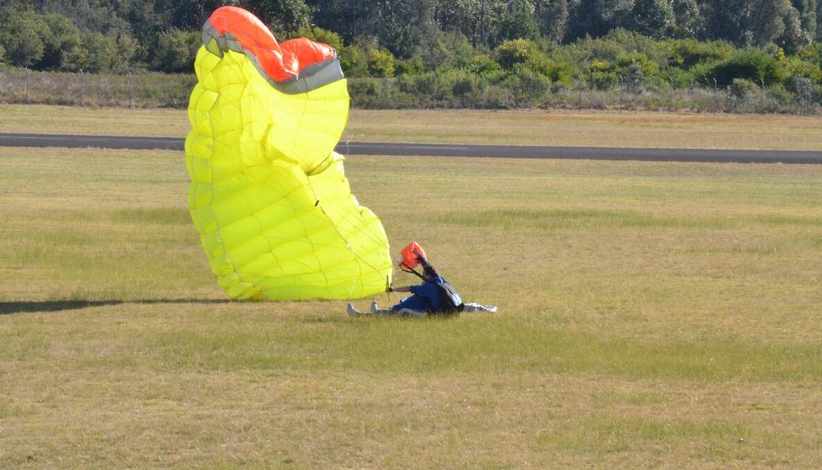 SAFE LANDING: The skydiving granny makes it back to earth in one piece. 