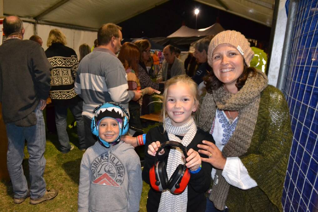EAR PROTECTION: Jodie Russell of Kiama and kids Sam Russell, 6, and Kate Webb, 7, came prepared with ear protection.