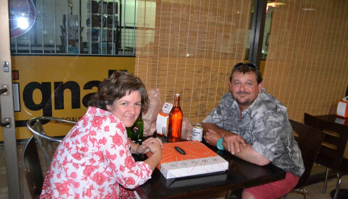   LITTLE JOES: Having a New Year’s Eve meal at Little Joe’s wood-fired pizza in Midtown Narooma are Angela McCleland and Des Moran from Bodalla. Photo by Stan Gorton
