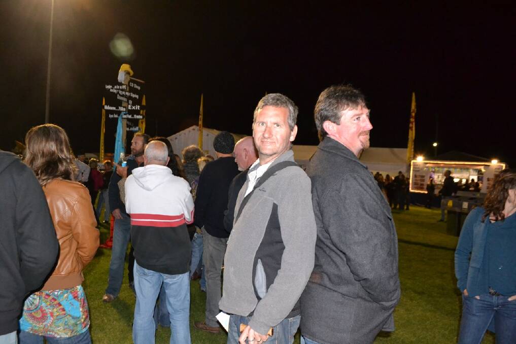 IN LINE: Narooma locals Matt Ratcliffe and Steve Hutcheson in the drinks tickets line.