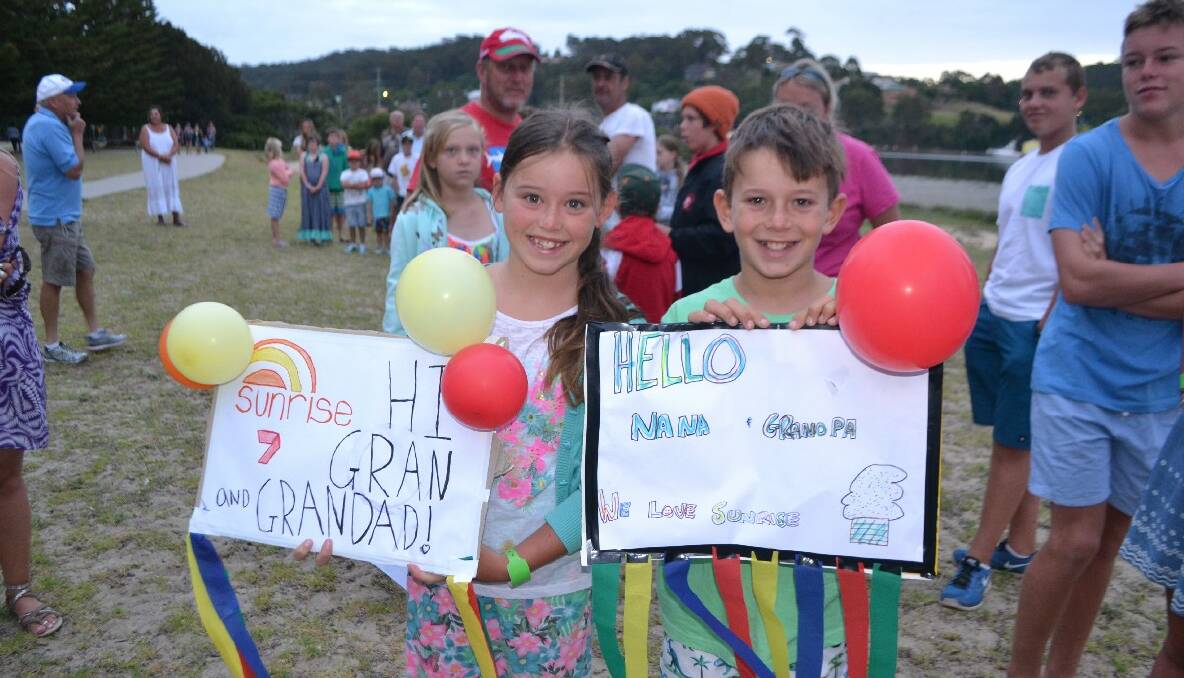 SUNRISE FANS: Wollongong kids Emma Oysten and Blake Hammond from Wollongong were staying in the park and have been coming to Narooma for the last seven years. 