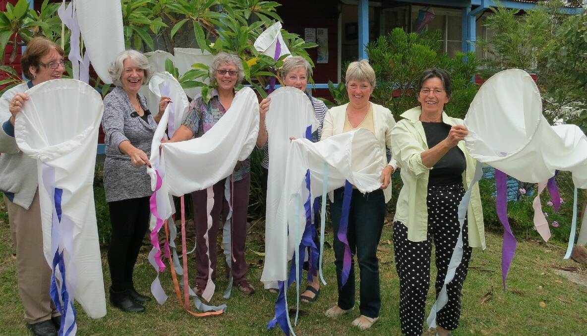 ART AND CRAFT: MACS’ Knit-wits and Sew-and-Sews have had great fun making windsocks for Narooma Oyster Festival – pictured are Josephine Elliot, left, Marilyn Gibson, Chris Perrott, Judy Glover, Roz Barr and Viv Wood. 
