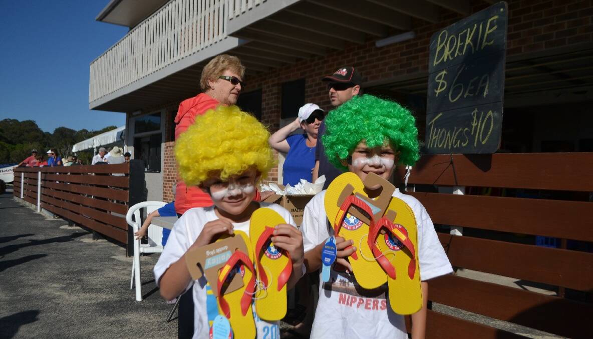 THONG BOYS: The Narooma Surf Life Saving Club was given double-plugger thongs by Volley to sell and pictured are two of the club’s youngest members Johnny and George Constable. 