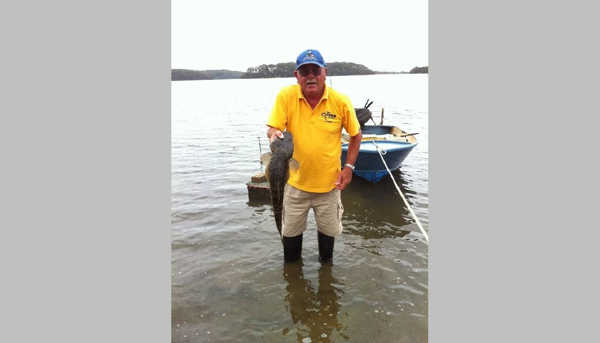 BANK FLATHEAD: Brian Brown with a nice 62cm flathead caught and released off the bank from his backyard. (24/12/2013) 