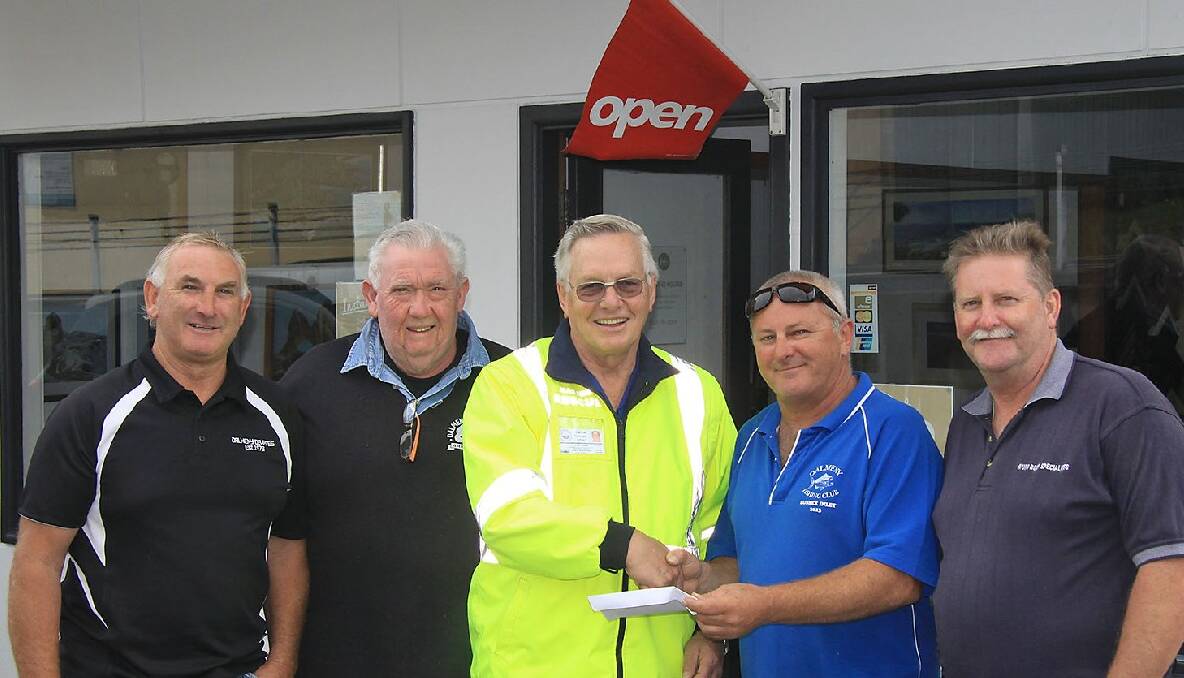 DEVIATES DONATION: Dalmeny Deviates Norm Budin, John Rowley, Russell Gotsalks and Peter Gruber present the donation to watch officer Brian Gunter of Marine Rescue Narooma. Photo by Shirley Gunter 