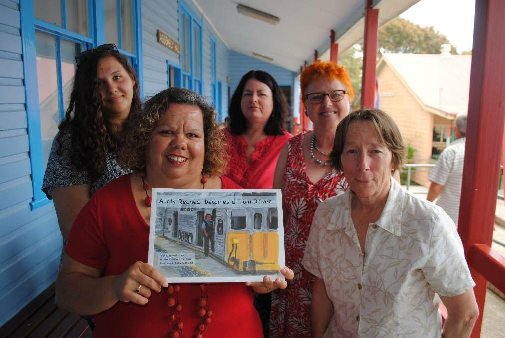 BOOK LAUNCH: Aunty Recheal Daley (front left), with her daughter Tathra Daley, artist Bethany Thurtell, author Phoenix Van Dyke and Tashe Long, facilitator of the Narooma Schools and Community Centres Project, at the book launch at Narooma Public School on Wednesday.