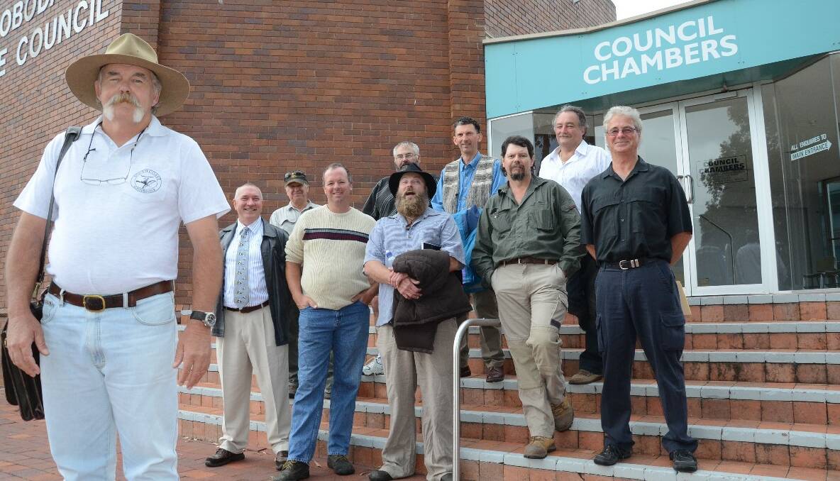 HUNTERS: South Coast Hunters Club president Dan Field with fellow hunters outside the council chambers on Tuesday night including Keith Bowden of Bermagui, Stuart Kennedy and Steve Urquhart of Narooma, Paul Fish of Batehaven, Alan Millar of Narooma, Roy Jenkins of Malua Bay, Paul Ziviani, Jeff Garrad of Tilba and Onno de Smeth of Bodalla.