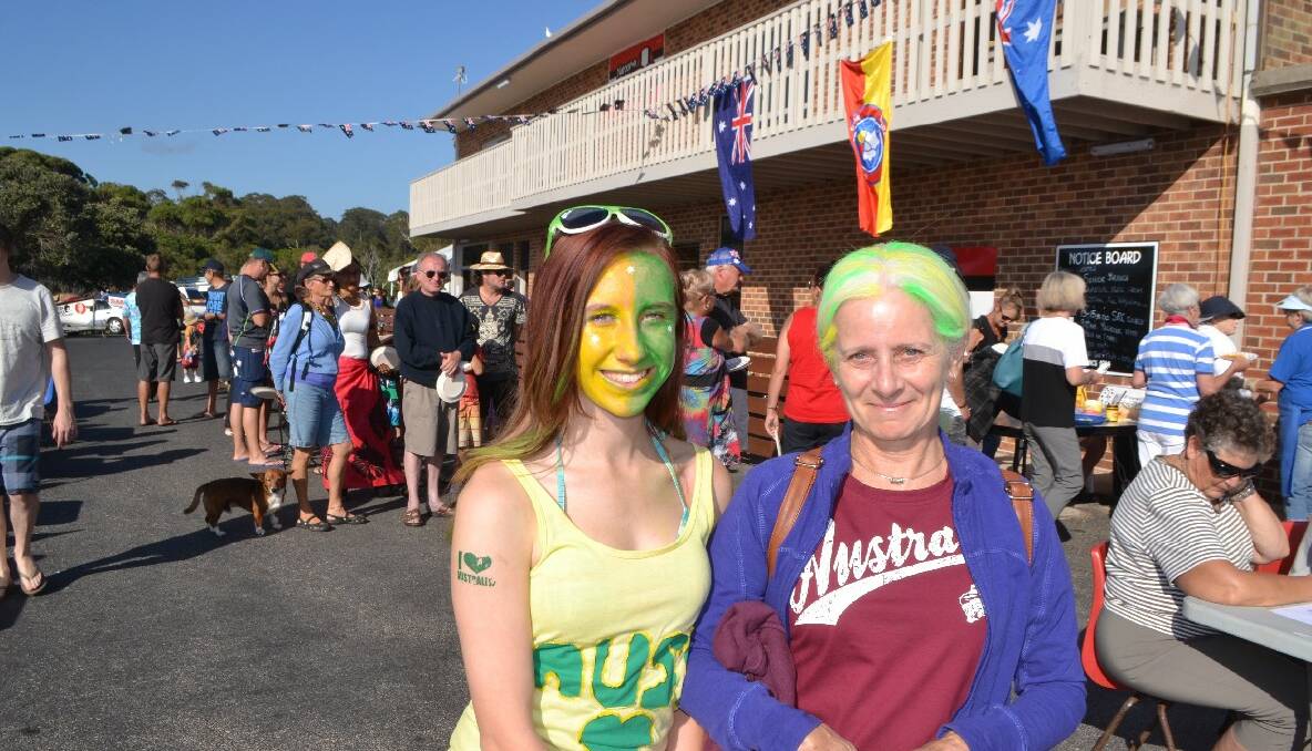 COLOURFUL VISITORS: Ailis Benson and mum Helen from Canberra go every year to the Australia Day breakfast at Commonwealth Park, Canberra but this year decided to come to Narooma instead and looked great in green and gold. 