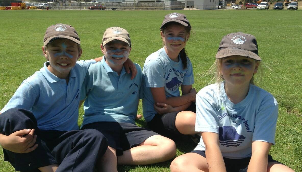 TILBA KIDS: Central Tilba Public School students Tommy, Coupar, Keira and Charlie had a great day at the cricket in Narooma last Thursday. 