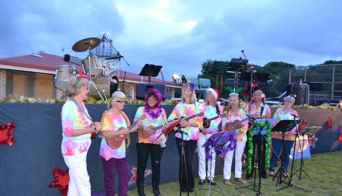 UKELELE LADIES: The local ukulele ladies were dressed in their usual bright colours. 