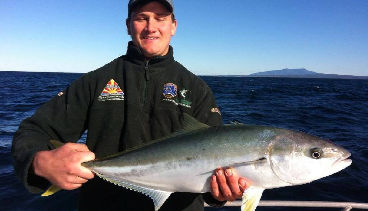 RARE KING: Charter Fish Narooma client Toby Wilson with a rare king from up Spud Point way. 