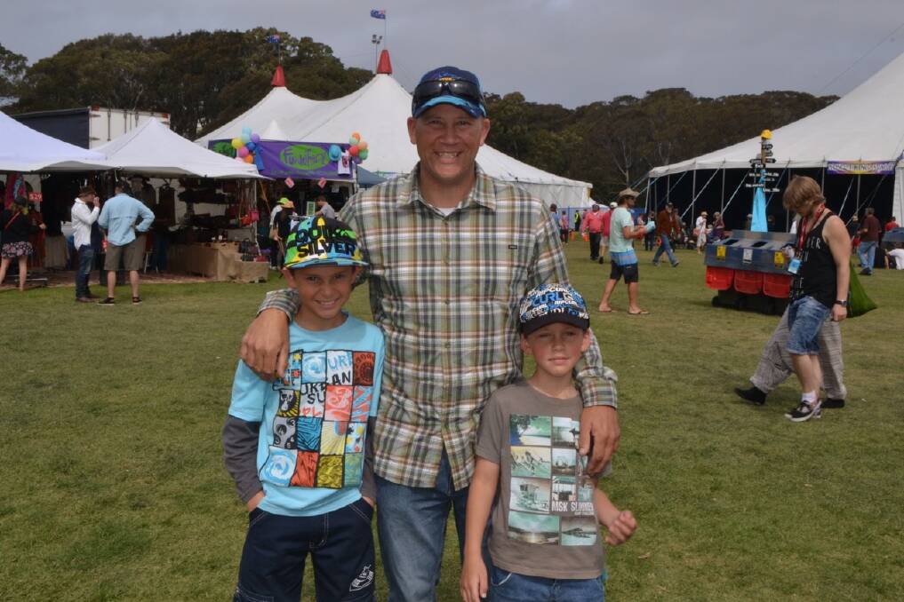 HOOTS CLAN: Narooma area locals Ian “Hoots” Cowie and sons check out the Narooma Blues Fest on Sunday afternoon.