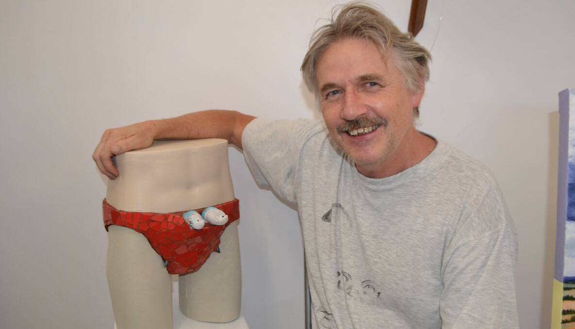 BUDGIE SMUGGLERS: Art appreciator and artist Tim Burke, who over the Blues Festival had his own show at SoArt, purchased Jan Atkinson’s mosaic red budgie smuggler complete with peeping budgies. 