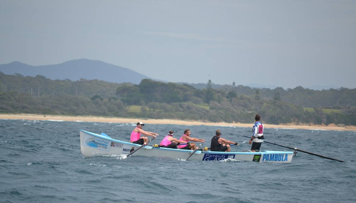 The Pambula vets  row to the finish at Bermagui in Day 4 of the 2013/2014 George Bass Surfboat Marathon.