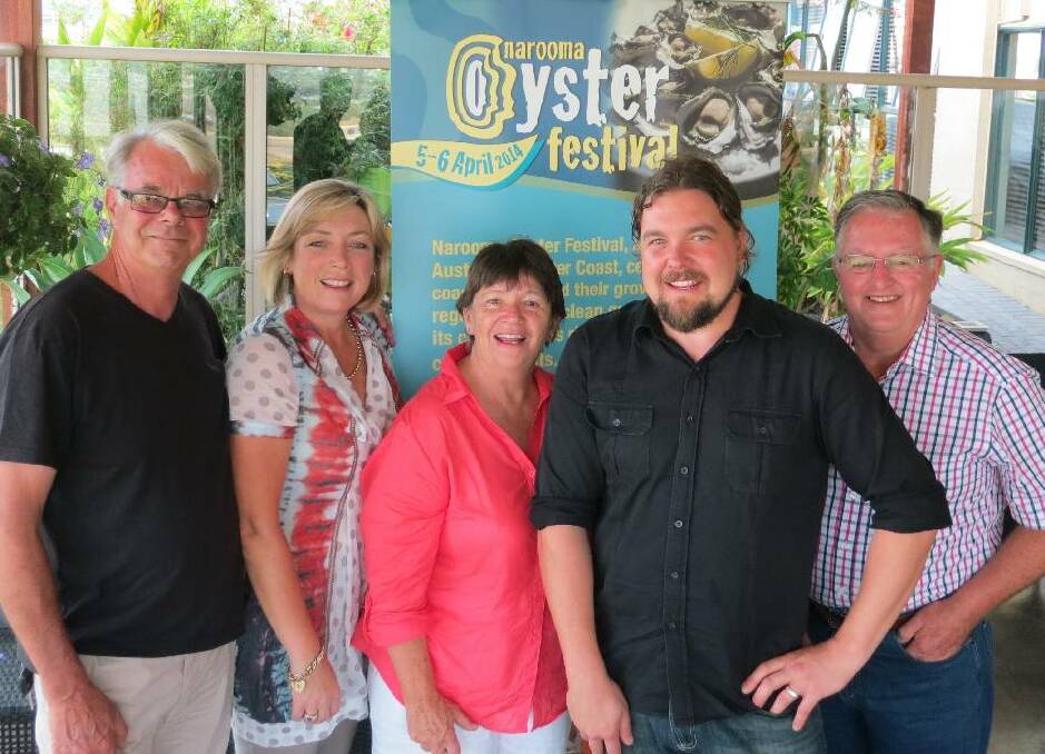 WEB LAUNCH: Narooma Oyster Festival organising committee members Garry Ebbeling, Cath Peachey, Laurelle Pacey and Paul Dixon with web designer Adrian Fisse, front, celebrating the oyster festival’s website launch at The Whale’s new Ocean Lounge. 