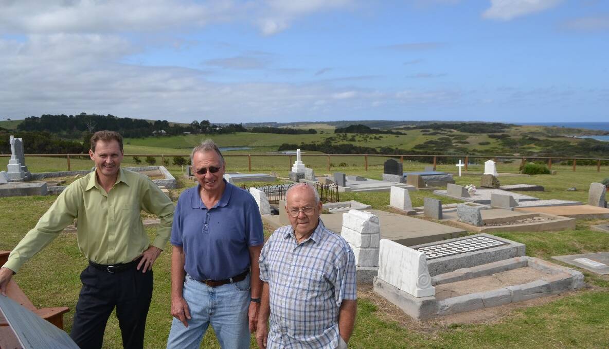 CEMETERY IMPROVEMENTS: Checking out the new sign and benches at the picturesque Tilba Cemetery last week are mayor Lindsay Brown and cemetery committee members Harry Bate and Norm Hoyer. 