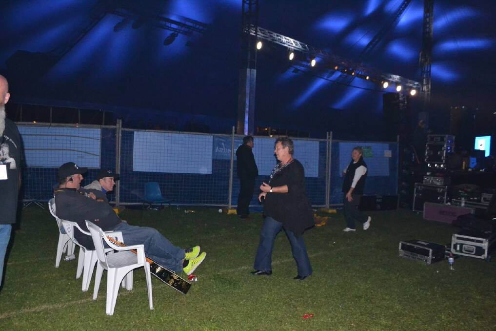 DANCING: Narooma Locals Suzie Egan and Cathy Cropper dancing backstage while Russell Morris plays on Sunday evening.