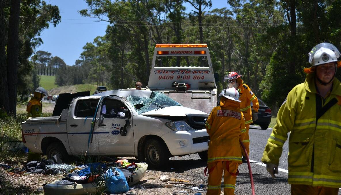 HIGHWAY CRASH: The driver of this utility was lucky to escape serious injury after swerving to avoid a turning vehicle and rolling several times on the Princes Highway south of Narooma on Sunday afternoon. 