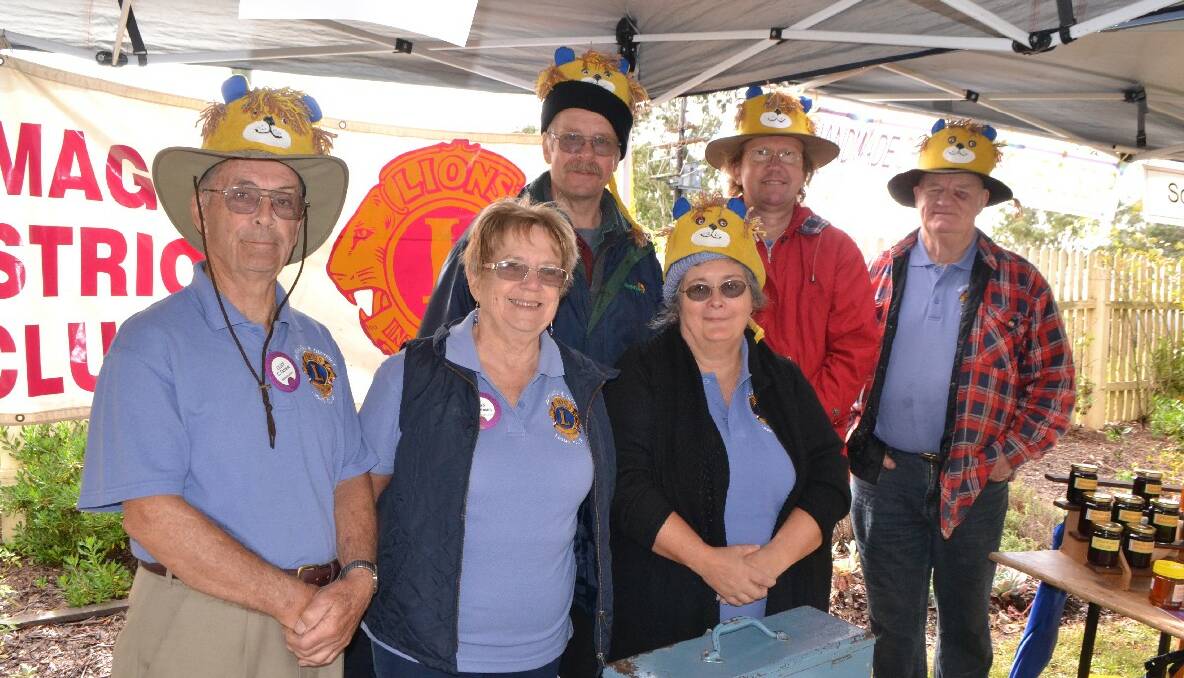 LIONS AT QUAAMA: Looking for members and selling sausage sandwiches were Bermagui and District Lions members Cliff Tarrant, Joan Robinson, Diana Holmes, John Holmes, Ian Connor and Ray Clements. Absent was Rita Tarrant. 