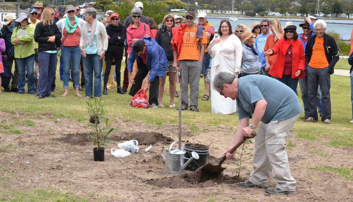 Clr Burnside, Ben Potter and a group of children then planted three trees in the park. 